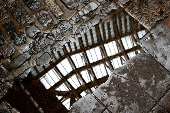 Reflection of Ceiling in Puddle at Leadenhall Market
