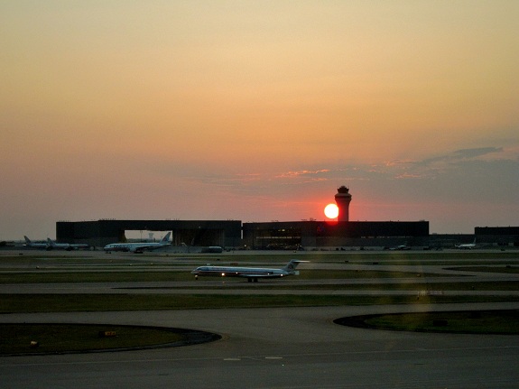 Sun Setting Behind the Tower at Dallas Fort Worth Airport